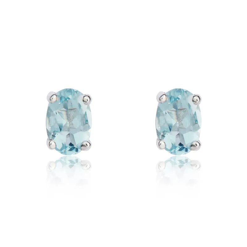 9ct White Gold Aquamarine 6x4mm Oval Claw Set Stud Earrings